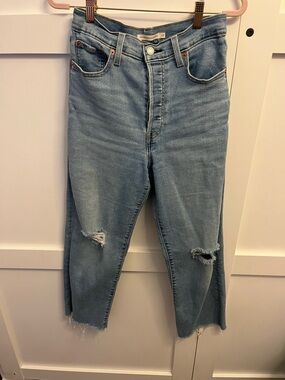 Levi Ribcage Straight High-Rise Light Blue Cropped Distressed Women’s Jeans